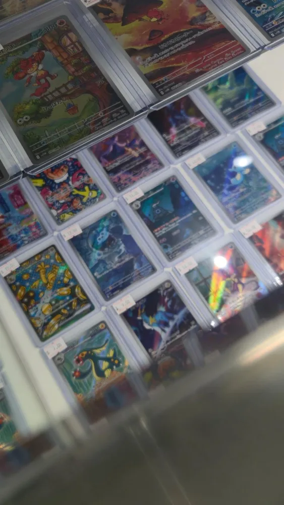 Pokémon cards in display case